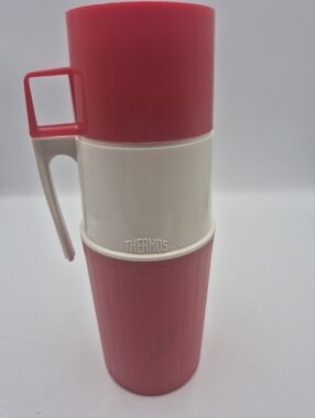 This item is a vintage Thermos vacuum bottle from the 70's